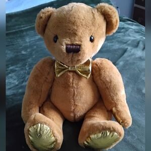 Plush Brown Teddy Bear with Gold Bow and Paw Accents
